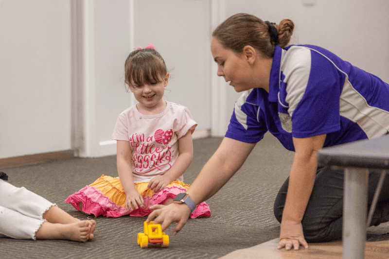 Educator with a child
